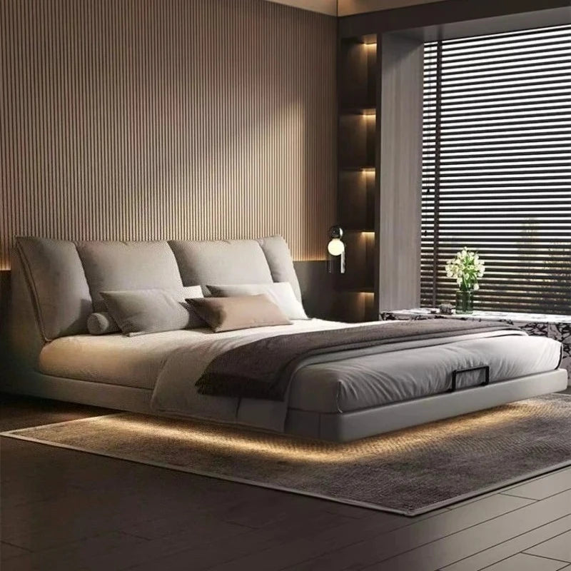 Modern leather double bed featuring a minimalist design, perfect for contemporary master bedroom aesthetics.